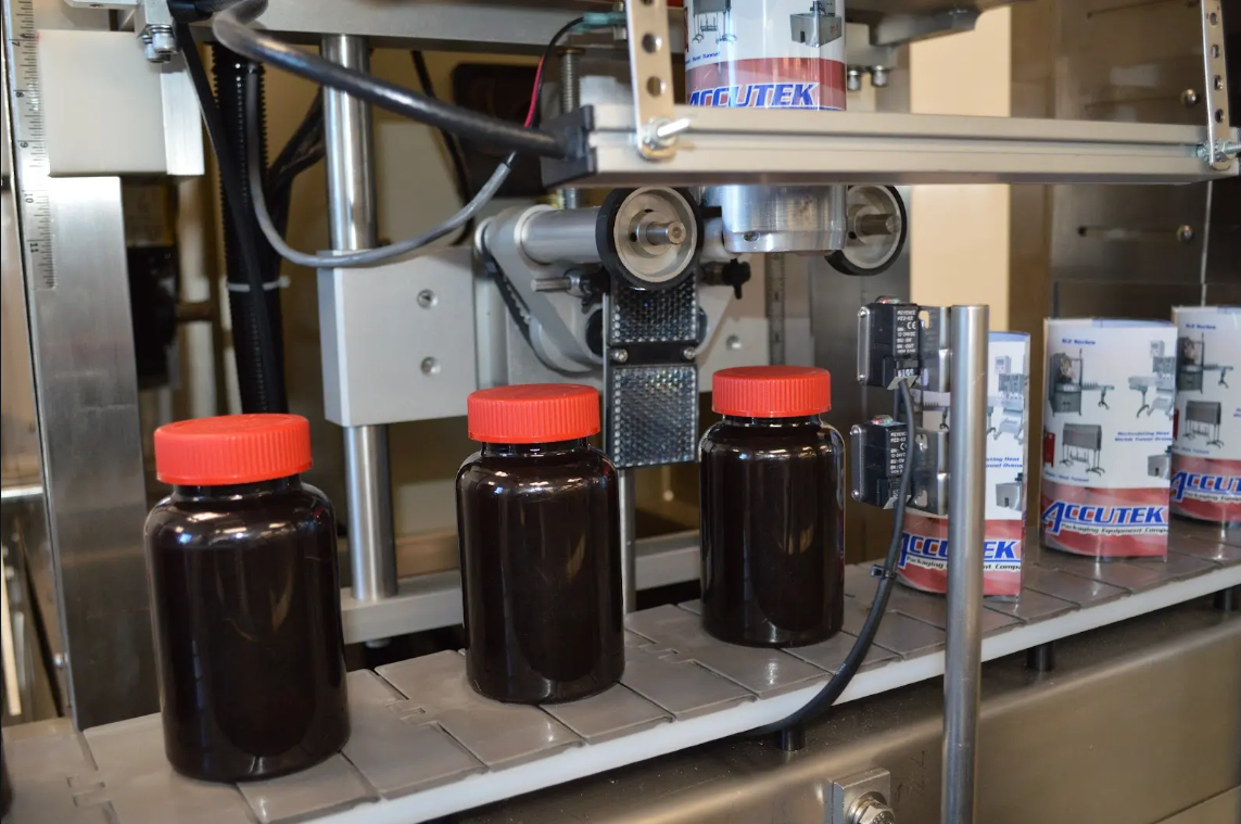 Accutek Automatic Sleeving Machine System