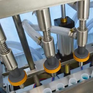 Automatic pressure overflow filling machine with three nozzles